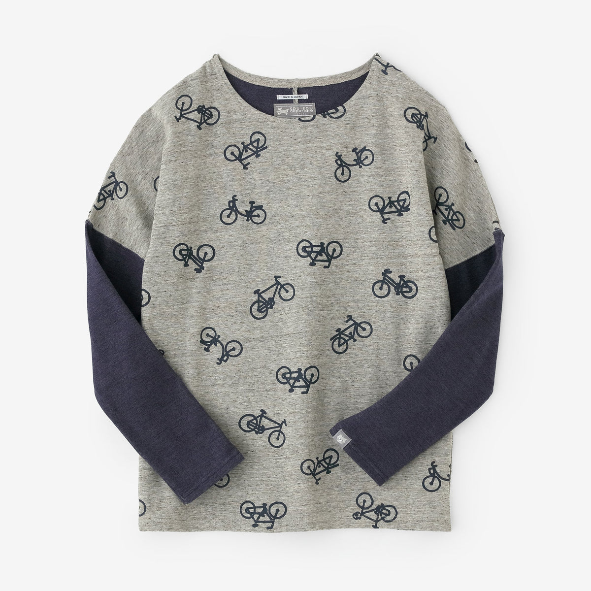 コットンリバーニット 型ぬき長袖Tシャツ／チャリンチャリンあっちこっち ヘザーサンドベージュ